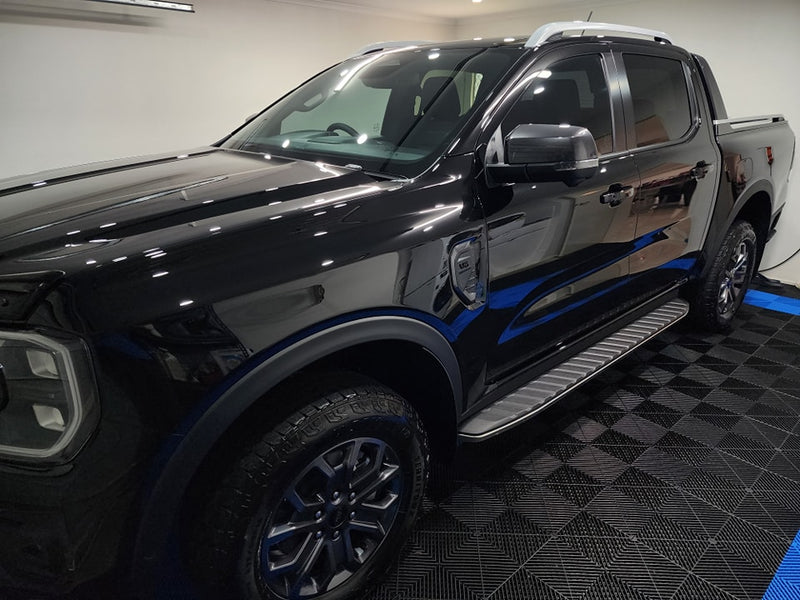 Professional car paint protection coating enhancing shine, durability, and easy cleaning